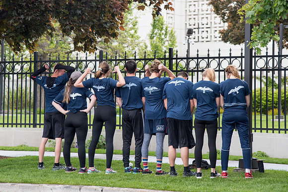 After braving the unpredictable Idaho weather in June, teams celebrate crossing the finish line near the Idaho Falls Temple in the annual temple to temple relay race.
