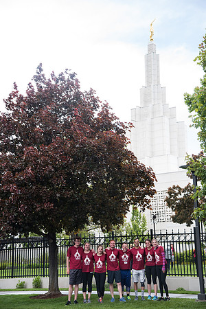 After braving the unpredictable Idaho weather in June, teams celebrate crossing the finish line near the Idaho Falls Temple in the annual temple to temple relay race.