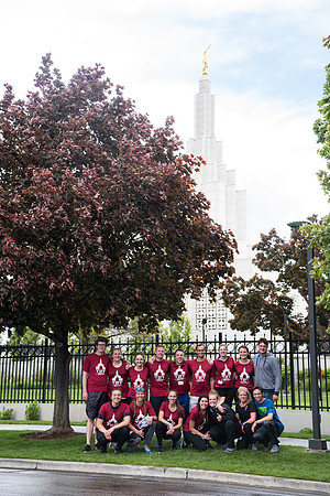 After braving the unpredictable Idaho weather in June, teams celebrate crossing the finish line near the Idaho Falls Temple in the annual temple to temple relay race.