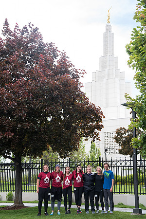 After braving the unpredictable Idaho weather in June, teams celebrate crossing the finish line near the Idaho Falls Temple in the annual temple to temple relay race.