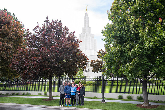 After braving the unpredictable Idaho weather in June, teams celebrate crossing the finish line near the Idaho Falls Temple in the annual temple to temple relay race.