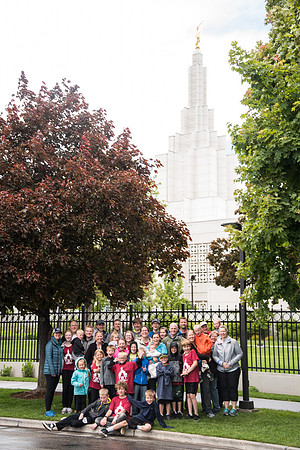 After braving the unpredictable Idaho weather in June, teams celebrate crossing the finish line near the Idaho Falls Temple in the annual temple to temple relay race.