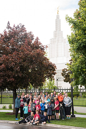 After braving the unpredictable Idaho weather in June, teams celebrate crossing the finish line near the Idaho Falls Temple in the annual temple to temple relay race.