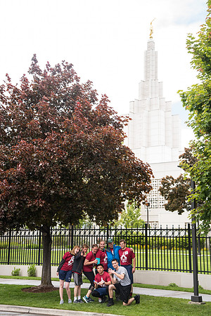 After braving the unpredictable Idaho weather in June, teams celebrate crossing the finish line near the Idaho Falls Temple in the annual temple to temple relay race.