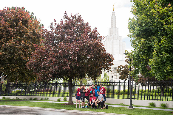 After braving the unpredictable Idaho weather in June, teams celebrate crossing the finish line near the Idaho Falls Temple in the annual temple to temple relay race.