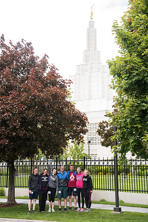 After braving the unpredictable Idaho weather in June, teams celebrate crossing the finish line near the Idaho Falls Temple in the annual temple to temple relay race.