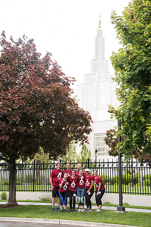 After braving the unpredictable Idaho weather in June, teams celebrate crossing the finish line near the Idaho Falls Temple in the annual temple to temple relay race.