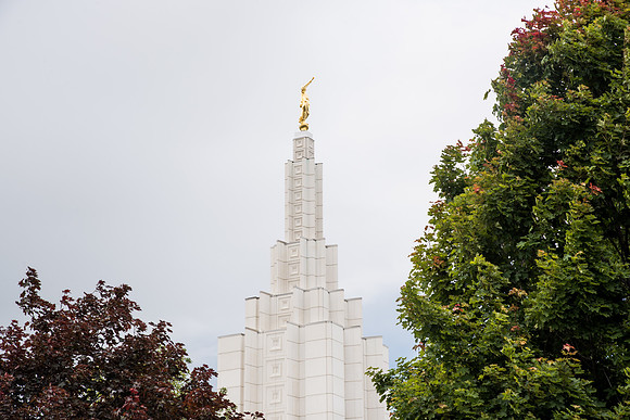 After braving the unpredictable Idaho weather in June, teams celebrate crossing the finish line near the Idaho Falls Temple in the annual temple to temple relay race.