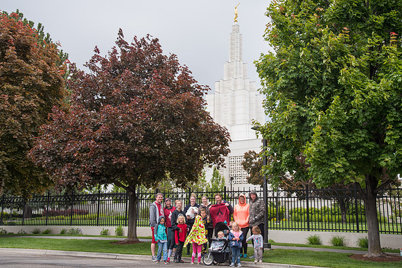 After braving the unpredictable Idaho weather in June, teams celebrate crossing the finish line near the Idaho Falls Temple in the annual temple to temple relay race.