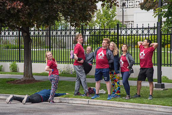 After braving the unpredictable Idaho weather in June, teams celebrate crossing the finish line near the Idaho Falls Temple in the annual temple to temple relay race.