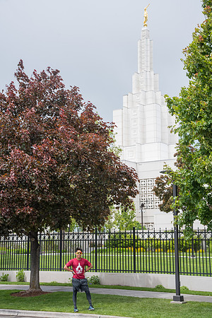 After braving the unpredictable Idaho weather in June, teams celebrate crossing the finish line near the Idaho Falls Temple in the annual temple to temple relay race.