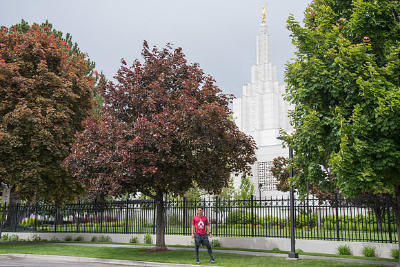 After braving the unpredictable Idaho weather in June, teams celebrate crossing the finish line near the Idaho Falls Temple in the annual temple to temple relay race.