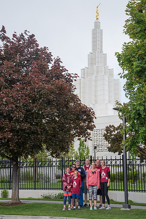 After braving the unpredictable Idaho weather in June, teams celebrate crossing the finish line near the Idaho Falls Temple in the annual temple to temple relay race.