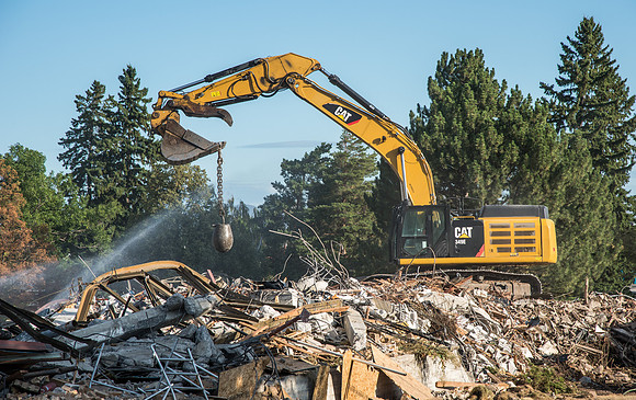 Remnants of the old Kirkham Building being hauled away.