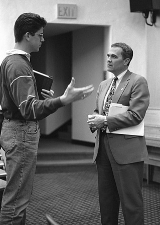 1993, Pres. Bennion talking with students after an Academic Lecture.