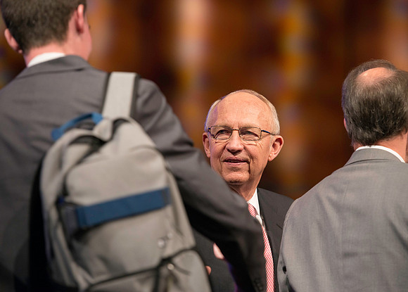 Emeritus General Authority of the Seventy greets students after the BYU-Idaho devotional.