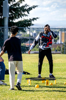 Students gather at the upper field for various 4th of July activities.