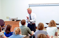 Religion Department faculty, Randy Hayes teaching in a classroom.