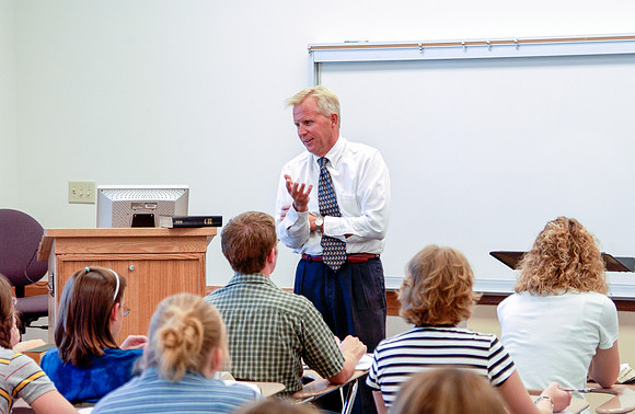 Religion Department faculty, Randy Hayes teaching in a classroom.