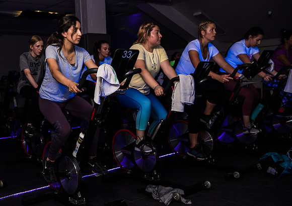 Cosmic Cycling - June 2019 - Black lights, glowsticks, Electronic Dance Music, and indoor cycling all come together for a night of fun. Held in Dance Studio 141 in the Hart building, Spring Semester.
