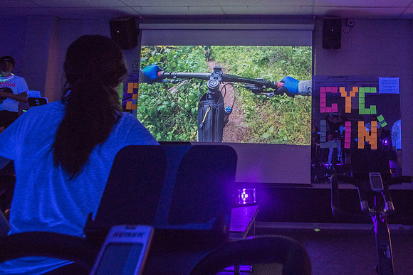 Cosmic Cycling - June 2019 - Black lights, glowsticks, Electronic Dance Music, and indoor cycling all come together for a night of fun. Held in Dance Studio 141 in the Hart building, Spring Semester.