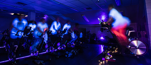 Cosmic Cycling - June 2019 - Black lights, glowsticks, Electronic Dance Music, and indoor cycling all come together for a night of fun. Held in Dance Studio 141 in the Hart building, Spring Semester.