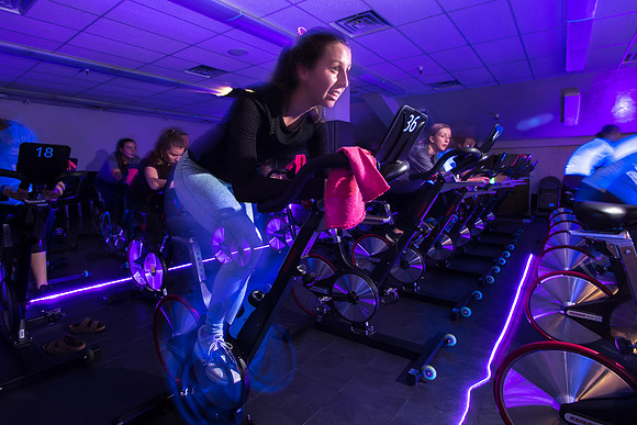 Cosmic Cycling - June 2019 - Black lights, glowsticks, Electronic Dance Music, and indoor cycling all come together for a night of fun. Held in Dance Studio 141 in the Hart building, Spring Semester.