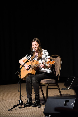 Acoustic Cafe - Held in the Manwaring Student Center in the Little Theatre the Acoustic Cafe had various live performers singing, and playing the guitar and other instruments.