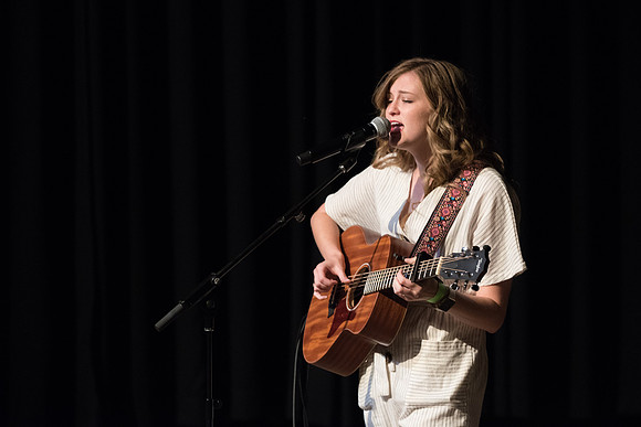 Acoustic Cafe - Held in the Manwaring Student Center in the Little Theatre the Acoustic Cafe had various live performers singing, and playing the guitar and other instruments.