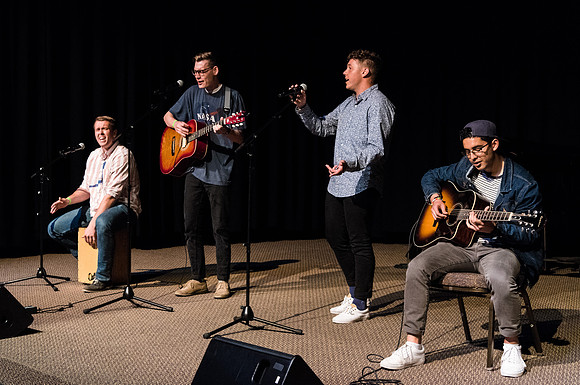 Acoustic Cafe - Held in the Manwaring Student Center in the Little Theatre the Acoustic Cafe had various live performers singing, and playing the guitar and other instruments.
