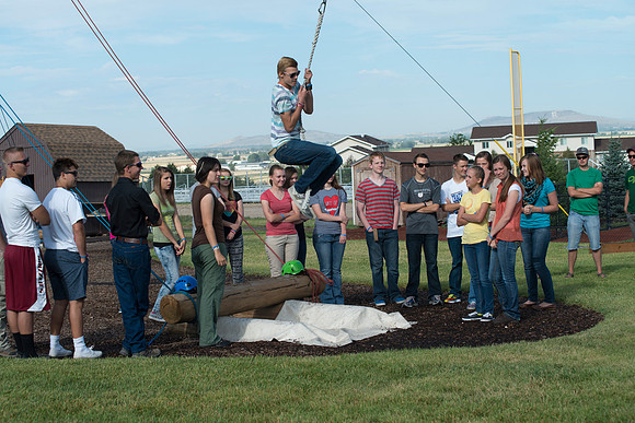 Youth high enjoy the Ropes Course class.