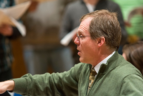 Randall Kempton instructs the talented students who make up the Collegiate Singers at BYU-Idaho.