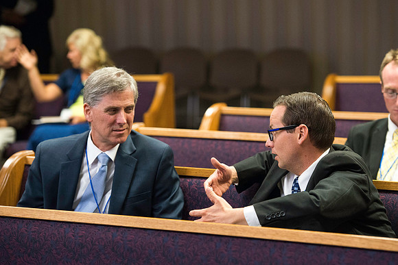 Faculty gather in the Hinckley Building for a conference to learn from their peers.