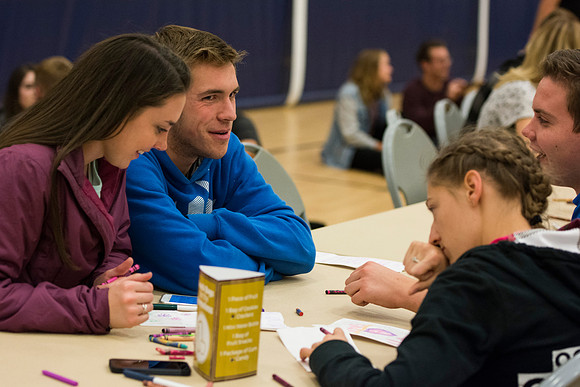 Students do a variety of service activies together with their dates.