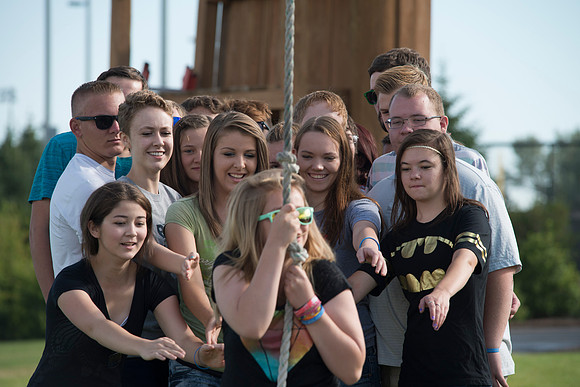 Youth high enjoy the Ropes Course class.