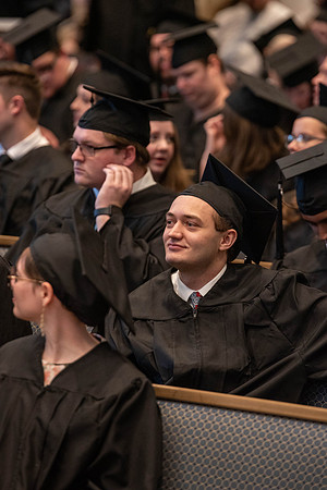 Students graduate from the College of Language and Letters. Jason Williams hands out the awards.