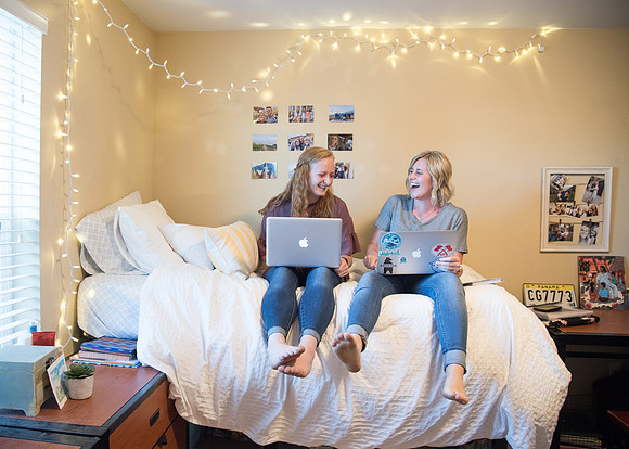 Roommates at BYU-Idaho's Nauvoo House Apartments enjoy each other's company.