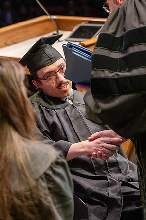 Students graduate from Academic Success and Interdisciplinary Studies in the Hart Building.