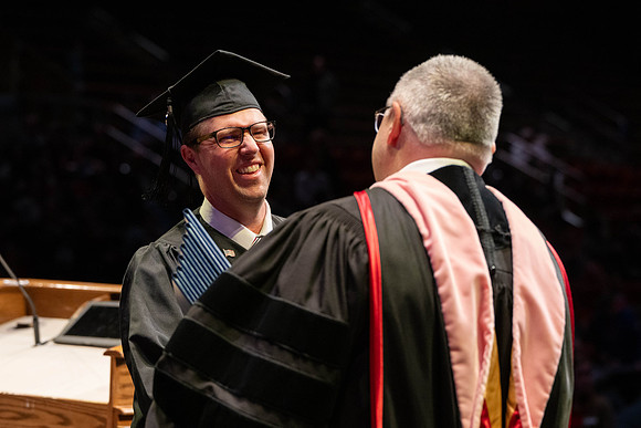 Students graduate from Academic Success and Interdisciplinary Studies in the Hart Building.