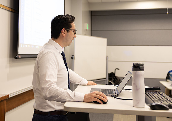 A professor teaches in the Science and Technology Center on the first day of Winter Semester.