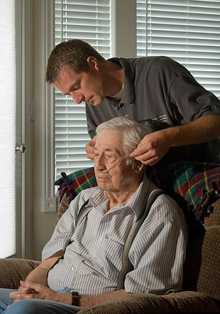 Casey Schanz, an intern with Teton Pharmacy works with elderly people in need of oxygen. Photos for an Internship brochere.  2007