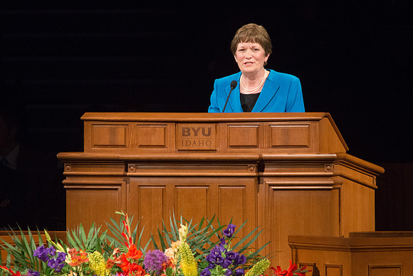 Julie Willis speaks at devotional about the importance of asking questions and learning.