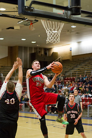 The 88er's D.J. Elliott, goes up for a lay-up during the Men's Basketball Championship Game.