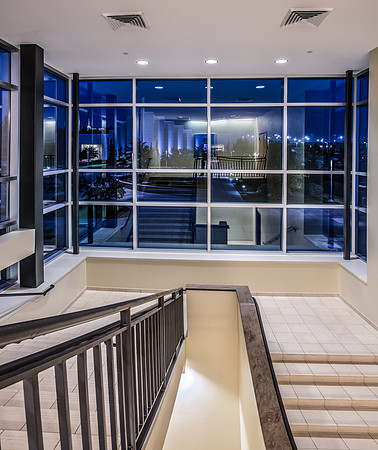 A stairwell in the Manwaring Center looking out onto the Taylor plaza.