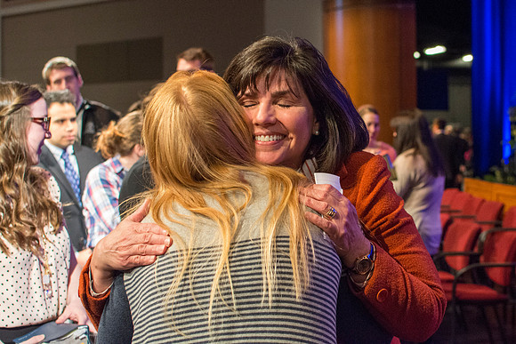 Carole Stephens meets with Brigham Young university-Idaho students and shakes hands with them. Photo by Ryan Chase