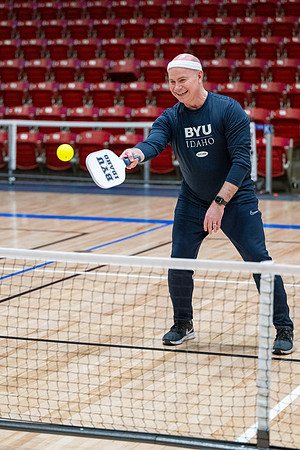 President & Sister Meredith playing pickleball.