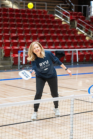 President & Sister Meredith playing pickleball.