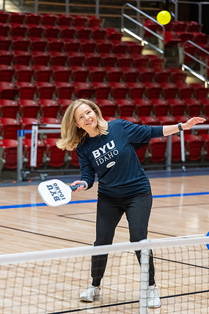 President & Sister Meredith playing pickleball.