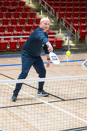 President & Sister Meredith playing pickleball.