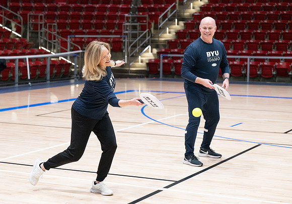 President & Sister Meredith playing pickleball.